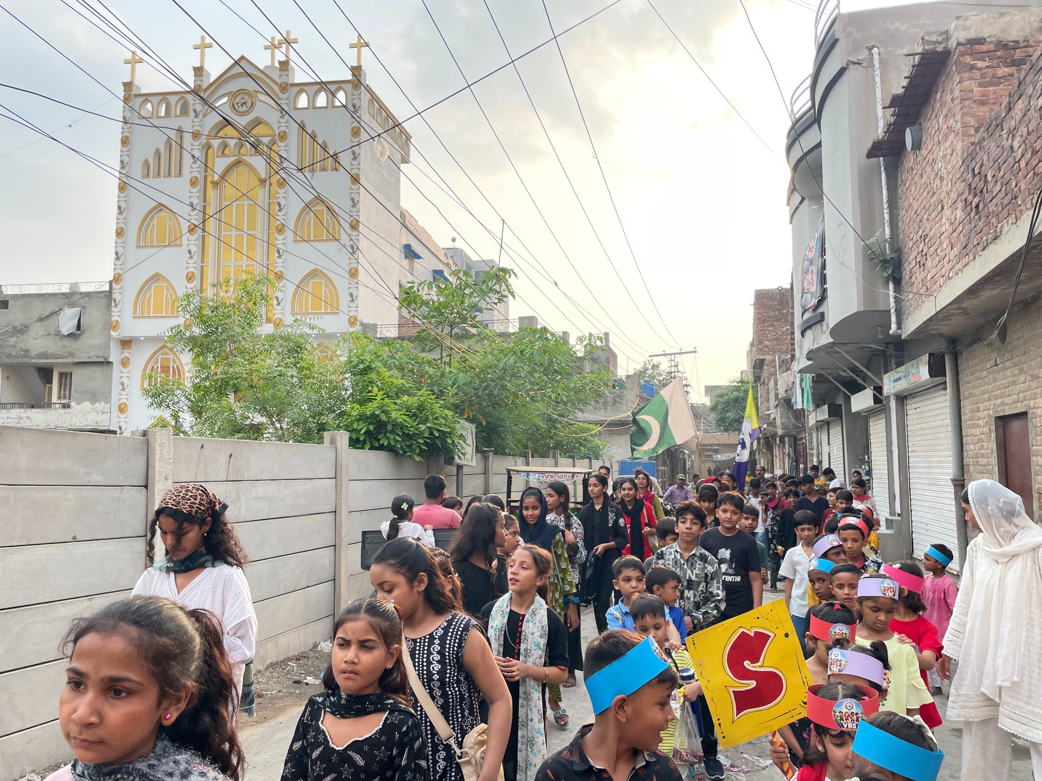 A VBS community procession demonstrates public fellowship.
