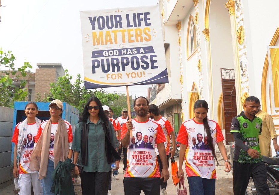 Young people carry a banner declaring that every life matters.